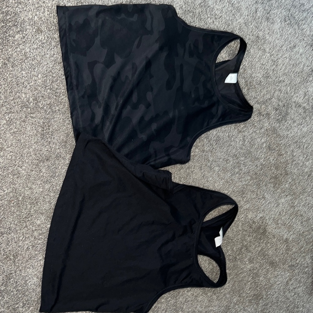 2 black workout tanks